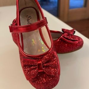 Red sparkly shoes